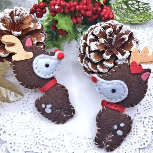 I just picked up this die set last week, it's been out for awhile and I'm so glad Simon still has this in stock. I'm making ornaments for the holidays and I definitely want to add this and more plush dies to the collection. I chose dark brown felt for his body and the thread I'm using is Sulky Sampler Neutrals Cotton Thread. I love this 2-strand thread to stitch with, but DMC thread works just as well. For one of the deer, I used red pom poms that I bought from Dollar Tree and the other I used the nose die from the set. I also got hipped onto Aleene's Tacky Glue from Nichol Sphor's YT video where she was making felt ornaments. I had been looking for a good liquid fabric glue for ages and I've tried different ones but with mixed results. I really like the Aleene's brand and so I used it on the deer's antlers, spots, the nose and its ears. I let it completely dry before filling it with some polyfil. They turned so cute! I die cut enough to make 4 sets of deers and I have a great idea for the last two so can't wait to get started on them. Some of the links to the products I used are affiliate links which means that when you shop with them, I’ll receive a small commission at no extra cost to you. Your support helps me run my small crafty business. Thank you so much! Crafter’s Edge Crossover II Fabric/paper Die Cutting Machine Assorted Felt (Wool Blend on AZ) Sulky Sampler Cotton Petites, 12-watt, Neutrals Assortment, 6-Pack DMC Needles Sizes 1 – 5, Sizes 18 – 22 Black pearl gems (comes in an assortment of sizes) Aleene's Tacky Glue